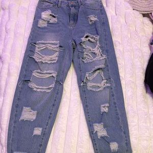 Distressed Blue Jeans